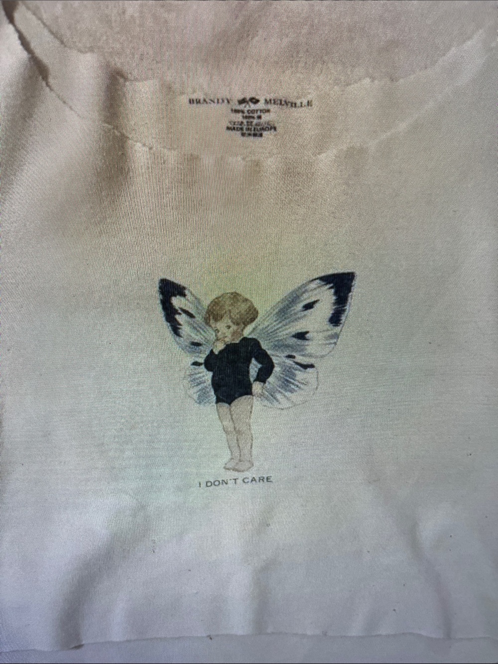 Brandy Melville Cream Tee with Butterfly Child Graphic